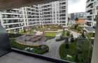 Apartament de închiriat 2 camere Nusco City Pipera | Vedere către grădina - 1