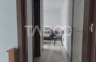Casa in zona centrala 5 camere 2 bucatarii 3 bai curte comuna Cisnadie