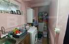 Casa cu 3 camere bucatarie si baie, suprafata utila 85 mp si un teren 600 mp - 12