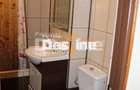 Apartament 3 camere decomandat de 61 mp 2 băi la parter cartier Favorit - Roman - 8
