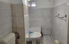 De inchiriat apartament 2 camere, situat etaj 1 in bloc mic, zona Hotel Vrancea. - 12