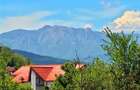 CASA PE PARTER IN BUJORENI - LINISTE, CURTE SI VEDERE SPRE VF. COZIA - 13