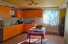 Proprietate deosebită în Buftea – casă P+1, teren 3.500 mp, magazin închiriat, l - 7