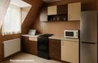 Casa formata din doua apartamente, cu curte de 450 mp, in zona Trei Stejari - 2