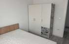 Apartament cu 2 camere de închiriat – modern, cu GRADINA PROPRIE