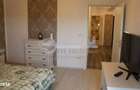 Apartament elegant cu 2 camere, 68 mp, lift și parcare subterană – T&#