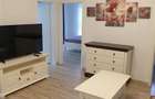Etaj 2 in bloc nou cu 2 bai, mobilat si utilat - 1