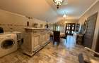 Spațiu comercial+locuință la mansardă,3 dormitoare, living,5 băi, teren 715 mp - 16