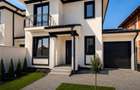 Duplex modern în Dumbrăvița despărțit prin garaj - 5 camere + garaj - 1
