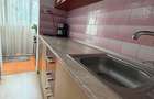 Vând apartament complet mobilat și utilat, decomandat, 2 camere, etaj 4/10. - 11