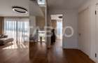 Apartament de lux de vanzare cu 3 camere cu gradina de 200 mp