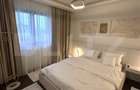 Apartament de lux,2 camere,2 băi,bloc nou,parter +parcare privată