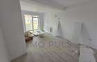 Apartament la parter cu balcon. Bucatarie separata. Loc de parcare - 1