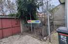 Rahova-Margeanului casa 100 mp, teren 315 mp,deschidere 13,5 ml,garaj - 4