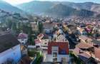 La poalele Tâmpei — vilă contemporană în Schei - 39