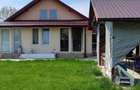 Tunari casă în Dimieni – 3 camere, curte amenajată, grădină cu seră, parcare - 4