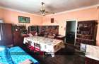 Casă din cărămidă cu teren generos de 2460 mp și anexe, în Borlești - 9