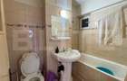 Apartament de 3 camere decomandat, 75 mp, 2 băi, 2 balcoane, etaj intermediar. - 17