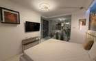 Apartament în Arcadia Domenii,230mp curte,3 parcări incluse