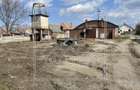 Teren intravilat - zona Tractorului - 16058mp + 8 constructii separate - 1