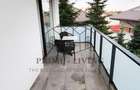 Apartament situat la etajul doi al unui bloc cu 3 etaje