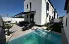 Casa de vanzare Berceni  P+1E - 5 camere - 3 bai - piscina si curte amenajata