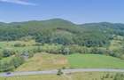 Teren de 4.000 mp cu deschidere la DN73A – Cheile Rasnoavei - 7