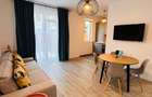Închiriez apartament 2 camere, cu gradina amenajată in bloc nou.