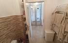 Apt 2 cam. 49.81 m.p. mobilat si utilat, loc de parcare subteran+boxa-33.03 m.p. - 17