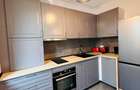 Închiriez apartament 2 camere, cu gradina amenajată in bloc nou.