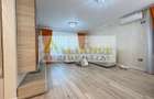 Casa P+1+M cu teren de 650 mp, piscina si curte complet amenajata