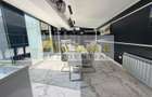 Casa P+1+M cu teren de 650 mp, piscina si curte complet amenajata