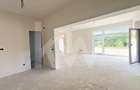 Casă arhitectură modernă cu panoramă spre Munții Făgăraș și Cetatea Cisnădioara