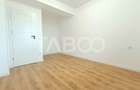 Apartament spatios 3 camere 2 bai - incalzire pardosea - parcare - 7
