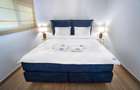 Apartament de inchiriat 2 camere, parcare proprie. Serviciu curatenie optional.