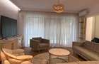 Apartament în Arcadia Domenii,230mp curte,3 parcări incluse