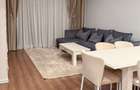  Apartament premium cu grădină proprie și două locuri de parcare. - 1