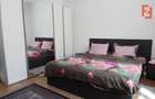 Casa individuala cu 6 camere Parter + 1 Etaj in Comlosu Mare - 13