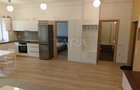 Apartament, curte privată, parcare subterană, zona Platinia.