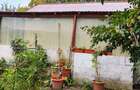 TEREN INTRAVILAN CU CASĂ ȘI ANEXE | 1.010 MP | IONĂȘENI, VÂRFU CÂMPULUI