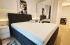 Ofer spre închiriere apartament 2 camere decomandat plus loc parcare subteran  - 4