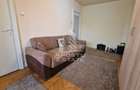 Apartament de vanzare cu 3 camere, centrala proprie, zona Dacia - 1