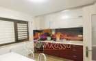 Casă P+1 de vânzare în Ovidiu Sud – 3 dormitoare, 3 garaje, teren 552 mp