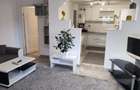 Se inchirieaza casa pe 2 nivele,duplex cu 3 camere,su 95mp,modern mobilat utilat - 1