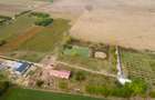 Casă cu teren 13 418 mp intravilan