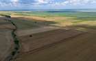 Vând teren agricol la șosea de 30.000mp în Iazurile comuna Valea Nucarilor 