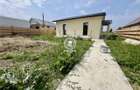 Casa cu 4 camere si 400mp de teren in Voinesti - 3