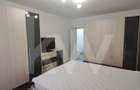 Apartament modern cu 2 camere, curte privată și 2 locuri de parcare