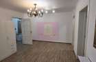 Apartament cu 2 camere, spatiu comercial – Campina, central