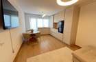 De inchiriat-apartament-2 camere-open space-nou-mobilat-utilat-parcare - 2